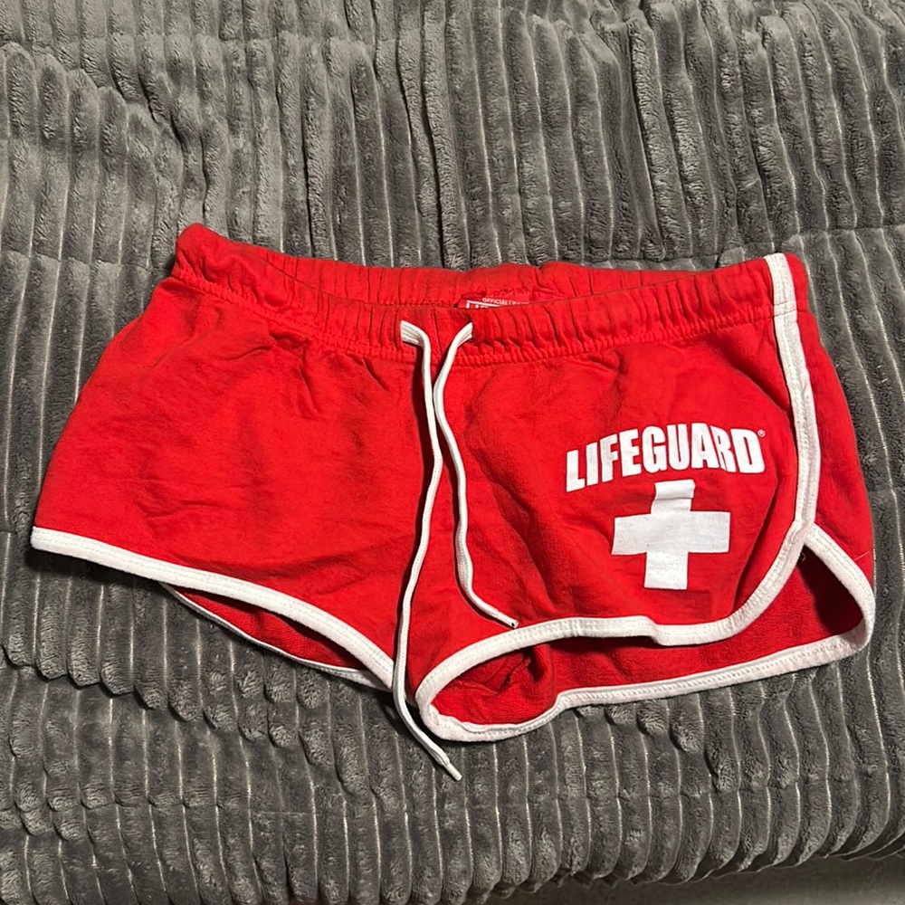 Red Lifeguard shorts, a size large